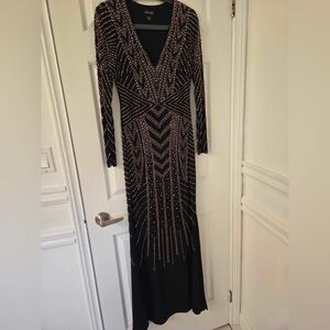 Xscape [ size 6] Sequin Long Sleeve Column Gown in Black and Gold/Rose Gold